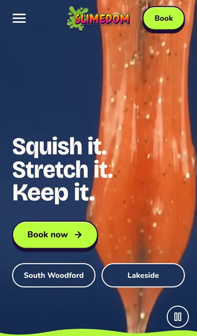 The home page on a phone: the headline over the slime clip, a Book now button and two venue pills.